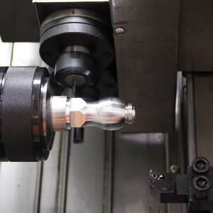 CNC Machining is a process used in the manufacturing sector that involves the use of computers to control machine tools. Tools that can be controlled in this manner include lathes, mills, routers and grinders. The CNC in CNC Machining stands for Computer Numerical Control.