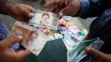 نرخ ارز و تاثیر آن بر اقتصاد